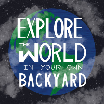 Handwritten text that reads EXPLORE THE WORLD IN YOUR OWN BACKYARD in front of an illustrated green and blue Earth on a dark gray background with stars and some translucent floating clouds
