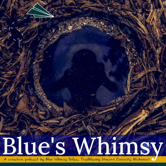 Broken blue glass bottle bottom in sand and mulch with photographer reflection; graphic of green paper airplane top left; text that reads Blue's Whimsy A creative podcast by Blue Whimsy Dulac, Trailblazing Unicorn Curiosity Alchemist